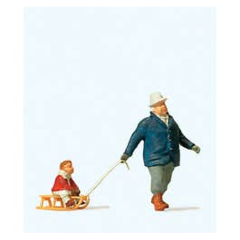 Preiser 28078  HO Man Towing Sled with Child