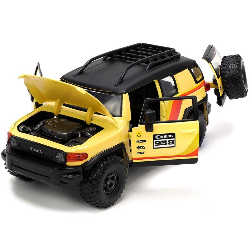 Toyota FJ Cruiser #938 Cream with Matt Black Top with Roof Rack and Stripes “KC Hilites” with Extra Wheels “Just Trucks” Series 1/24 Diecast Model Car by Jada