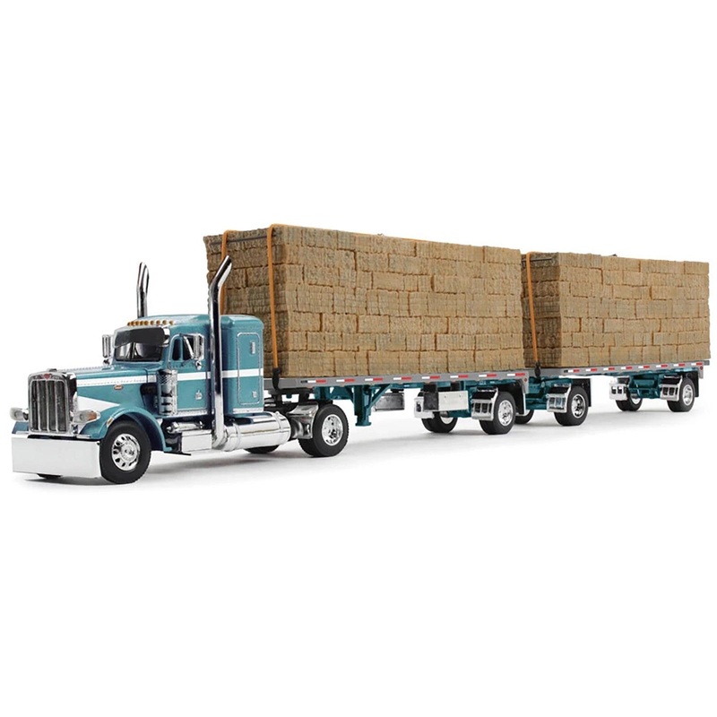 Peterbilt 389 36″ Flat Top Sleeper with Utility Dual 28.5′ Flatbed Trailers with Hay Loads Pacific Blue Metallic with White Stripes 1/64 Diecast Model by DCP/First Gear