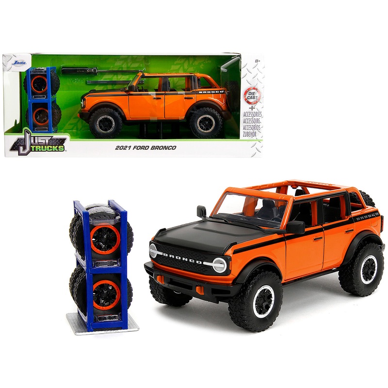 2021 Ford Bronco Open-Top Orange with Black Stripes and Hood with Extra Wheels “Just Trucks” Series 1/24 Diecast Model Car by Jada